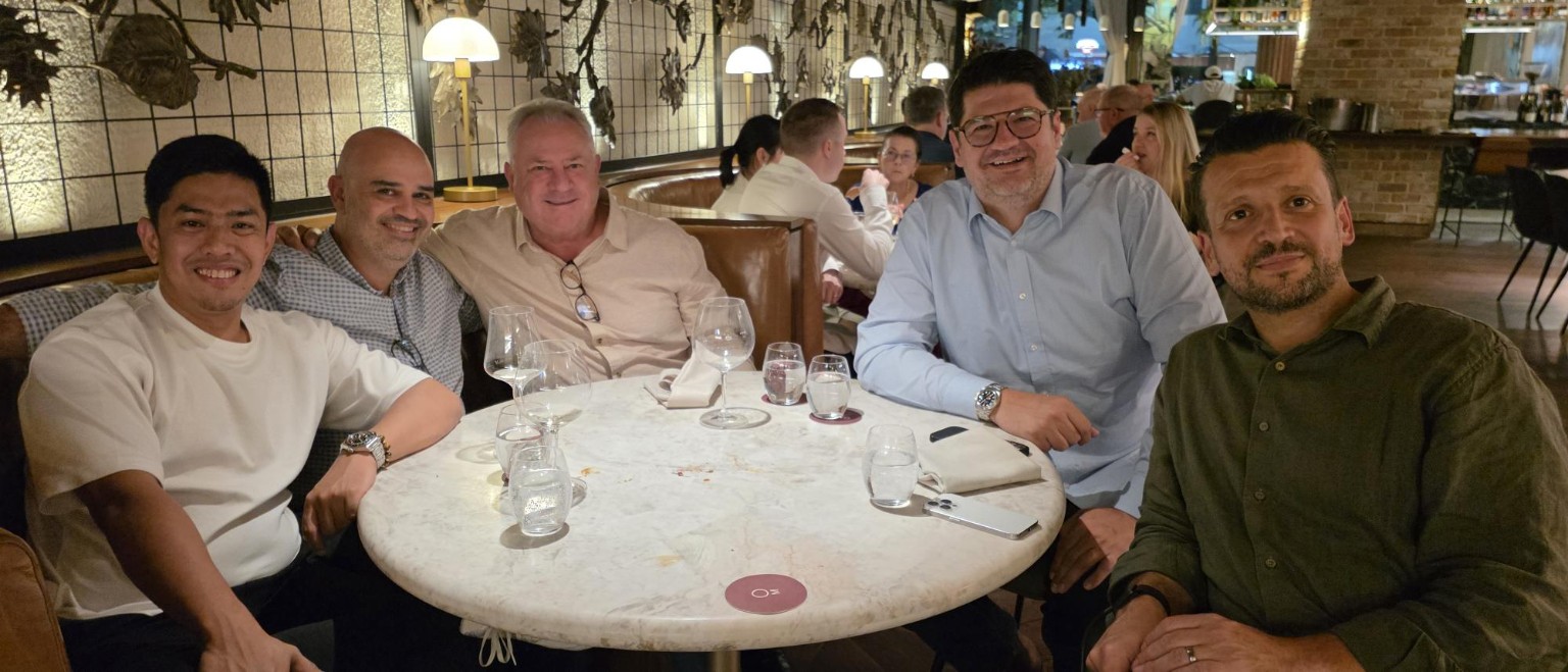 LeapOut and RCJ leaders gathered around a restaurant table